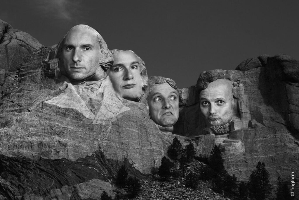 Die Köpfe durchbrechen die Mauer
